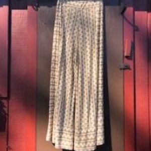 Anthropologie Palazzo Pants, Size Large. cream colored background
